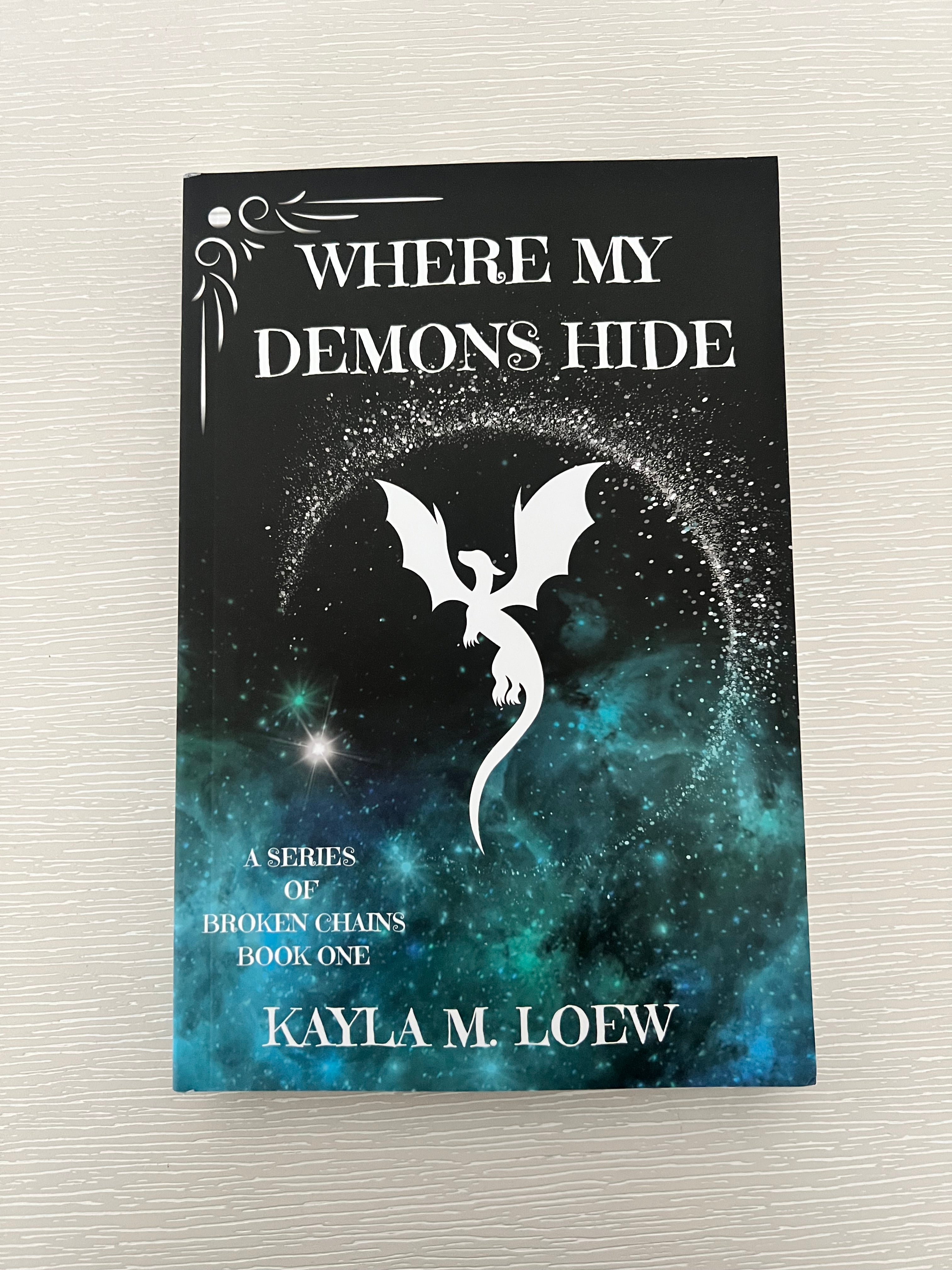 Where my demons hide signed paperback by Kayla Loew sprayed edges