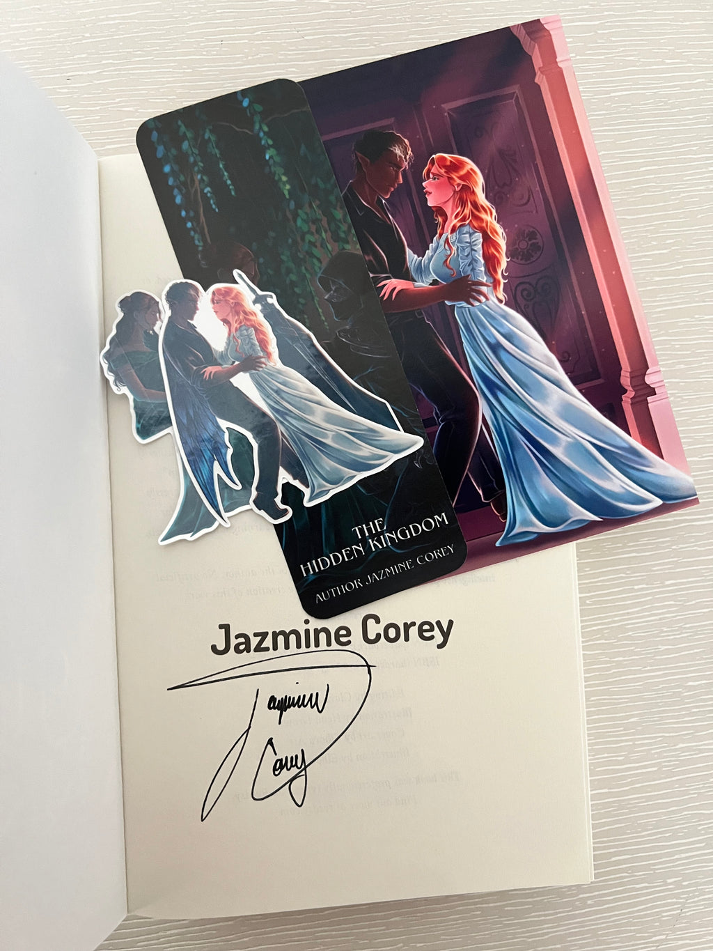 The Hidden Kingdom signed paperback by Jazmine Corey including character art & extras