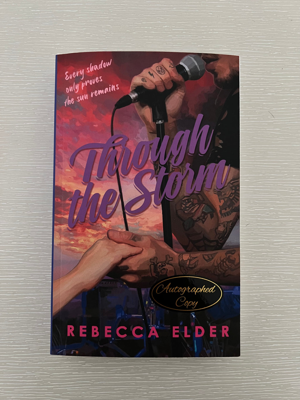Through the Storm paperback signed edition by Rebecca Elder with exclusive merch