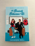 The Boards Between Us by Cassandra Moll signed paperback edition with bookmark