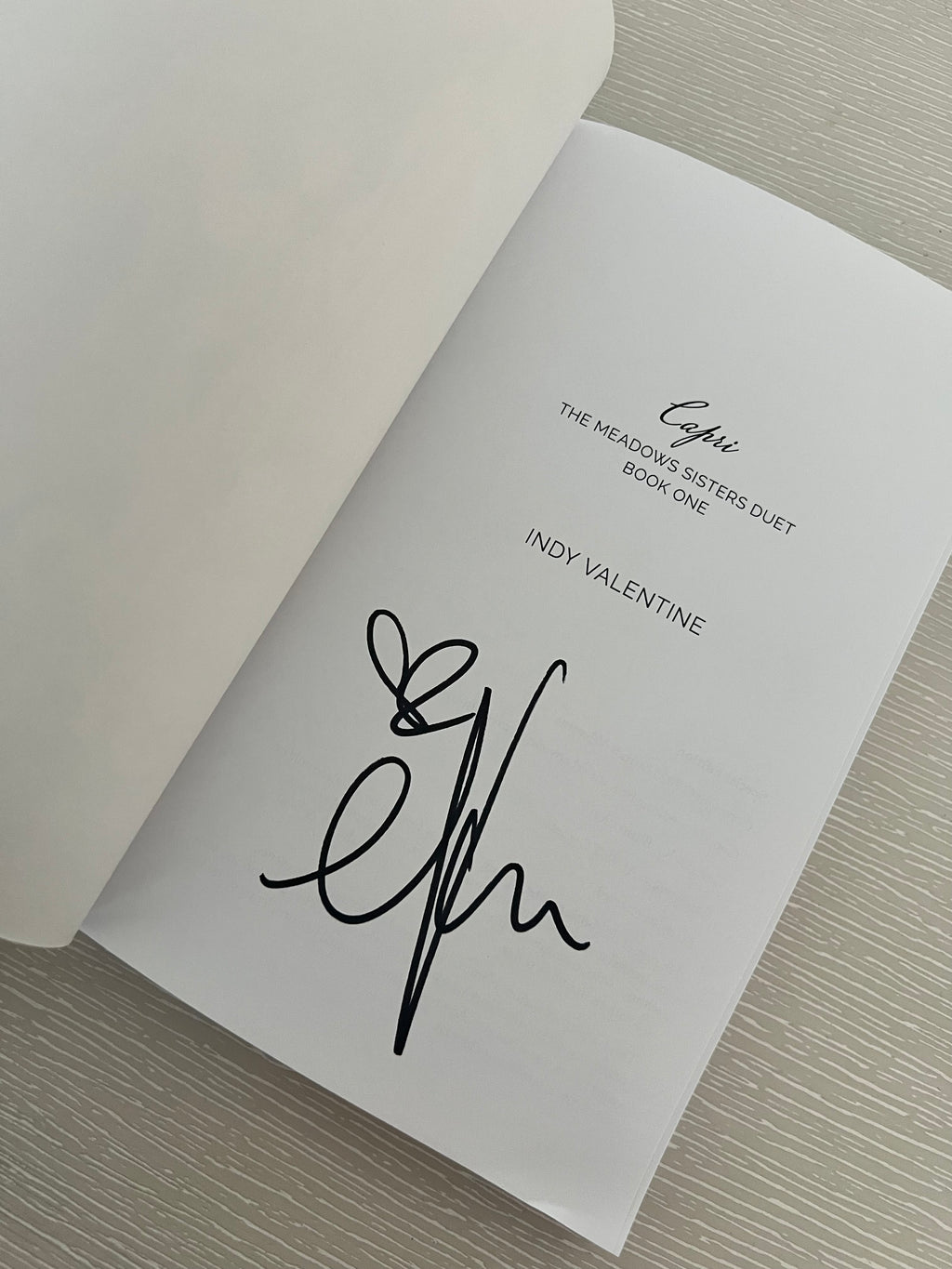 Capri by Indy Valentine signed special edition with character art & extras