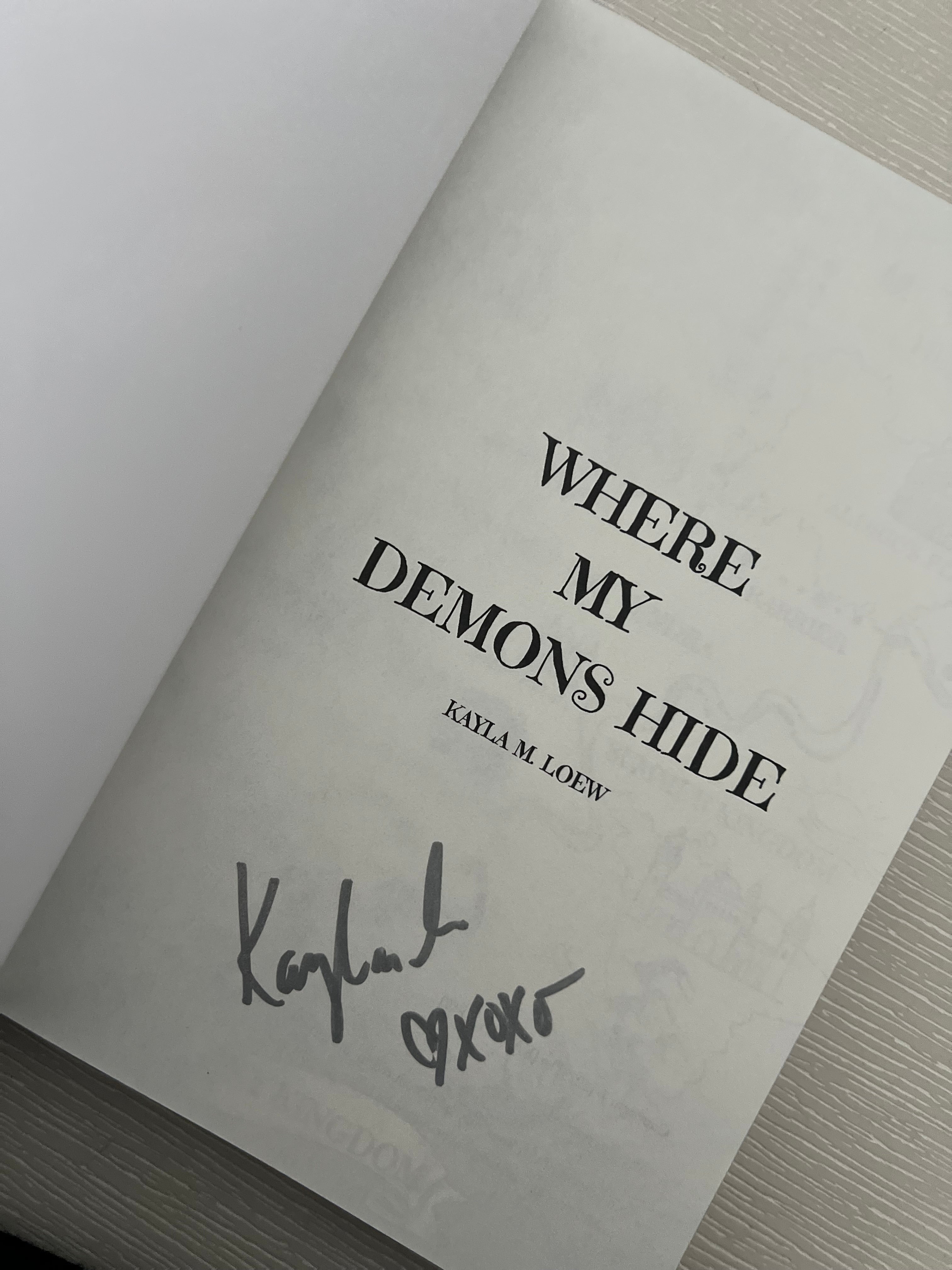 Where my demons hide signed paperback by Kayla Loew sprayed edges