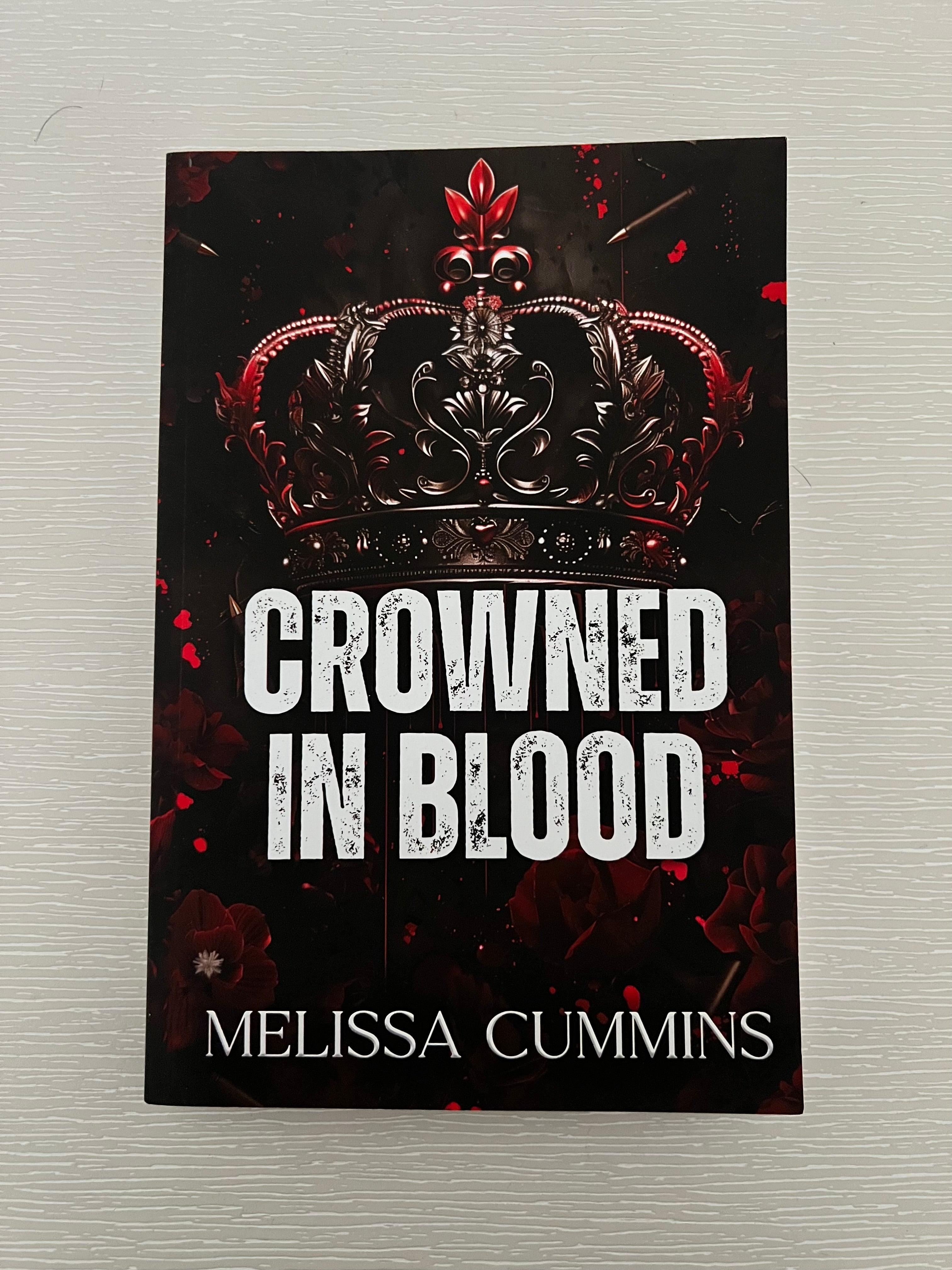 Crowned in Blood paperback by Melissa Cummings