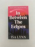 In between the Echoes Signed paperback by Isa Lynn with extras
