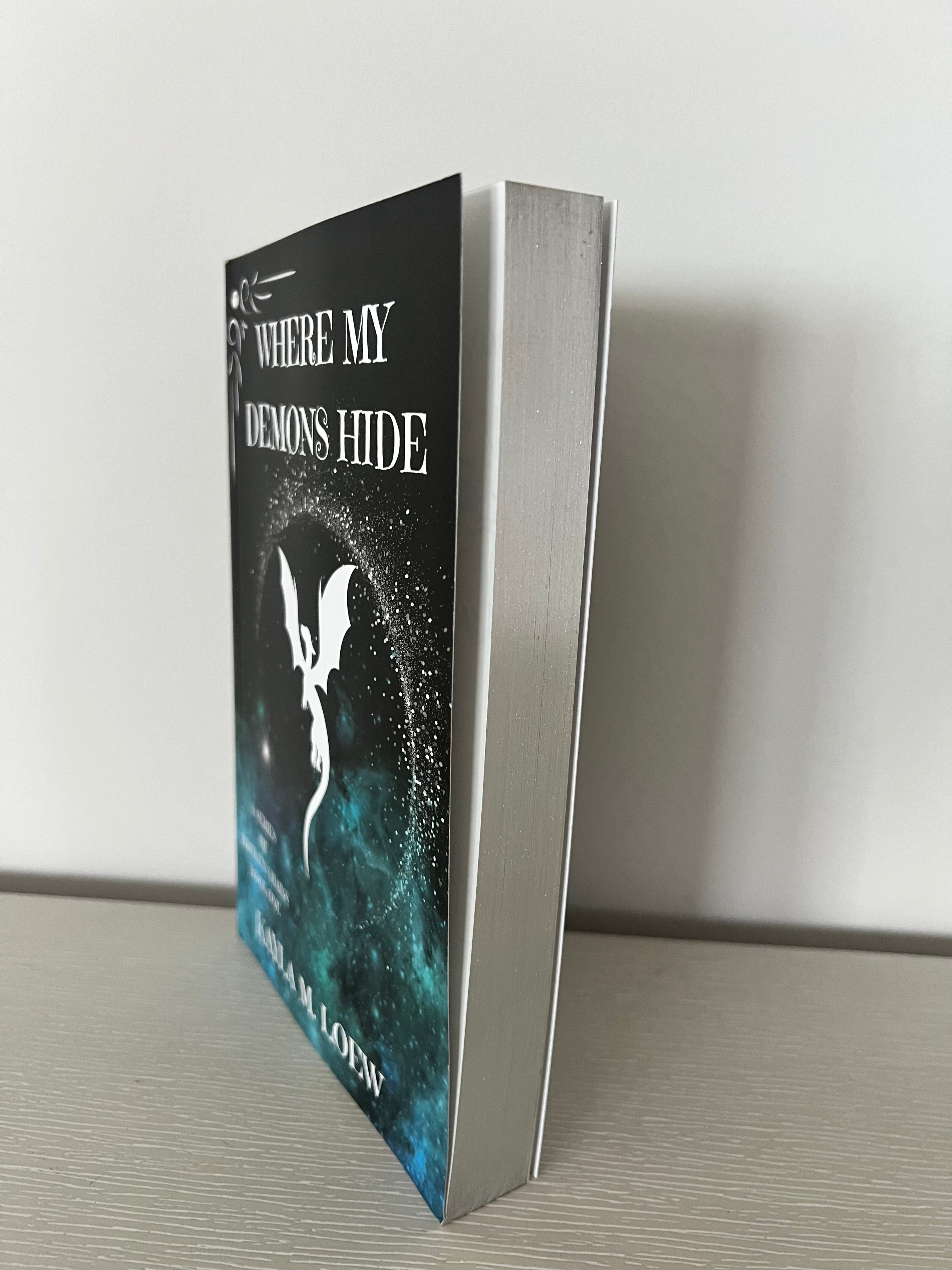 Where my demons hide signed paperback by Kayla Loew sprayed edges